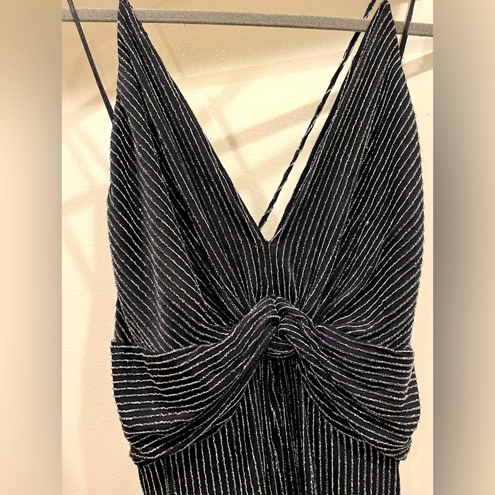 ASTR silver sparkly striped jumpsuit 1970s Hollywood glam
